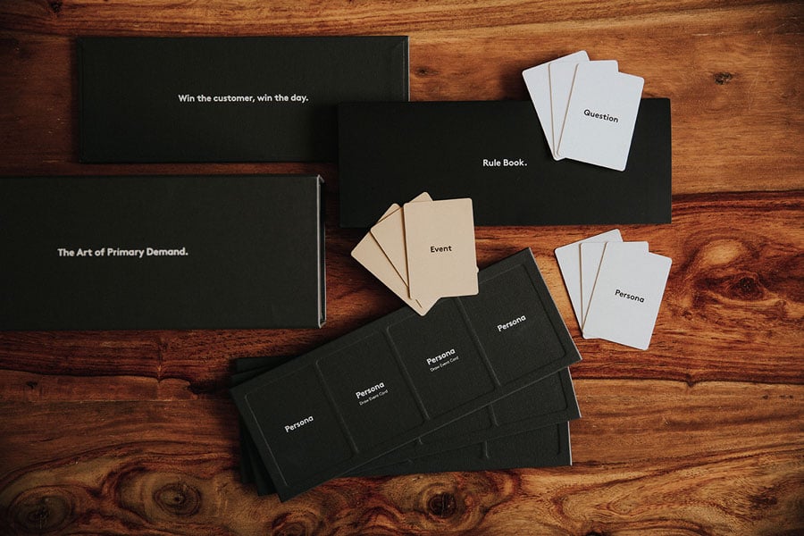Laminex card game boxes and cards on a table
