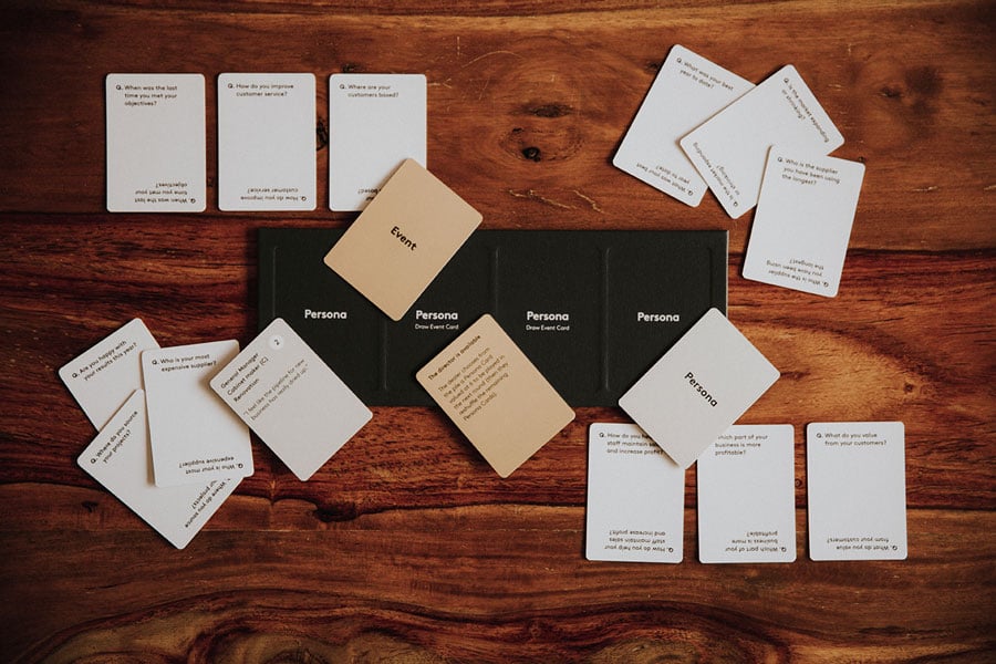 Laminex game cards laid out on a table