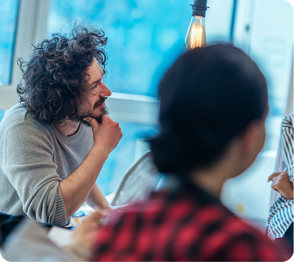 Colleagues in a focused discussion