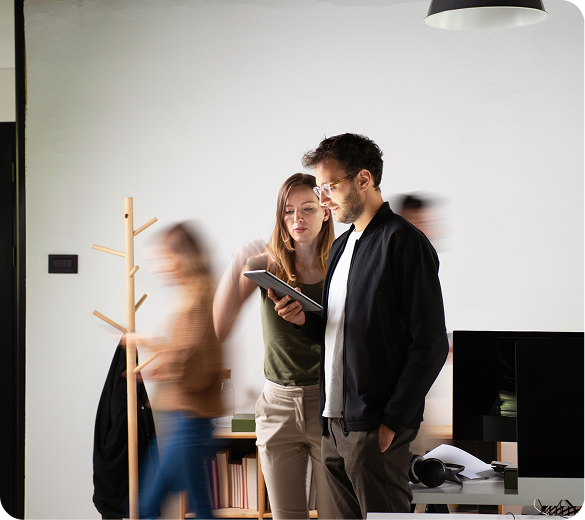 Colleagues talking in a modern office